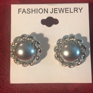 Faux grey pearl earrings in silver setting.